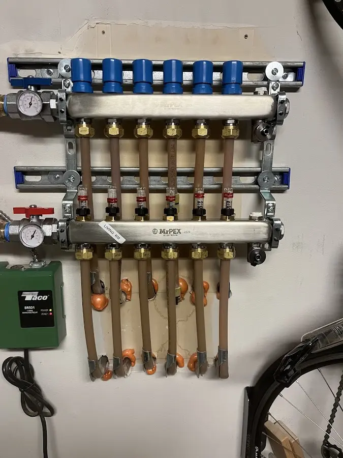 Plumber performing Gas Line Installation at a residential property in Crockery